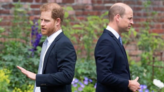 Prince Harry, left, and Prince William, attend the unveiling of a statue of their mother, Princess Diana at The Sunken Garden in Kensington Palace, London on July 1, 2021, which would have been her 60th birthday.