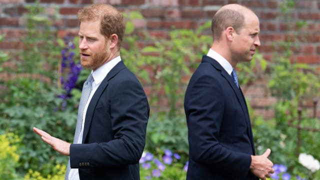 Britain's Prince Harry, Duke of Sussex (L) and Britain's Prince William, Duke of Cambridge attend the unveiling of a statue of Princess Diana at The Sunken Garden in Kensington Palace on July 1, 2021, which would have been her 60th birthday.