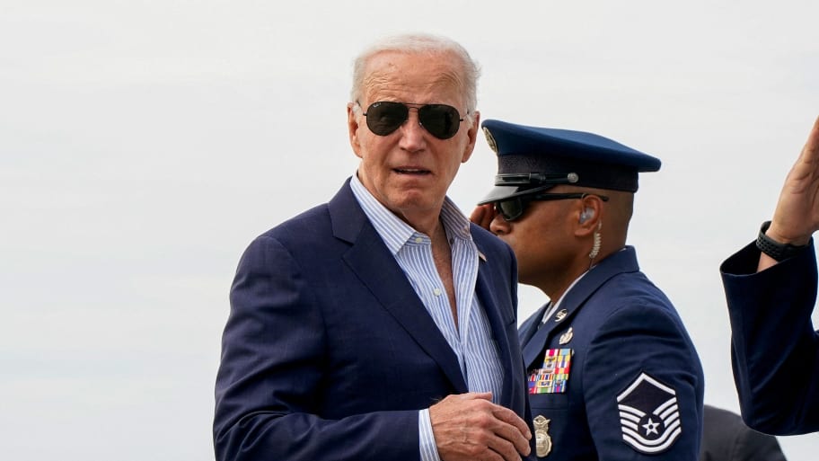 U.S. President Joe Biden looks back before boarding Air Force One at Francis S. Gabreski Airport in Westhampton Beach, New York, U.S., June 29, 2024.