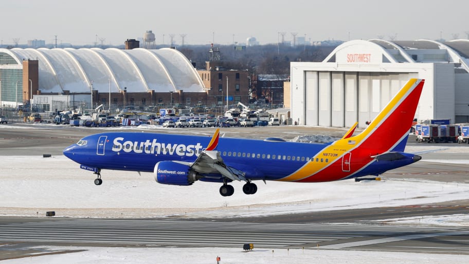 A Southwest Airlines plane lands at the Chicago Midway International Airport. 