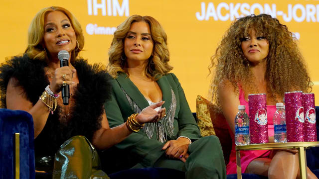 Photo of Gizelle Bryant, Robyn Dixon, and Ashley Darby at BravoCon