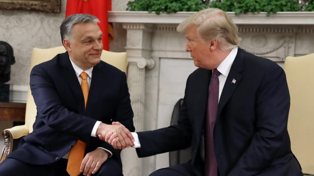 U.S. President Donald Trump shakes hands with Hungarian Prime Minister Viktor Orban during a meeting in the Oval Office on May 13, 2019 in Washington, DC.
