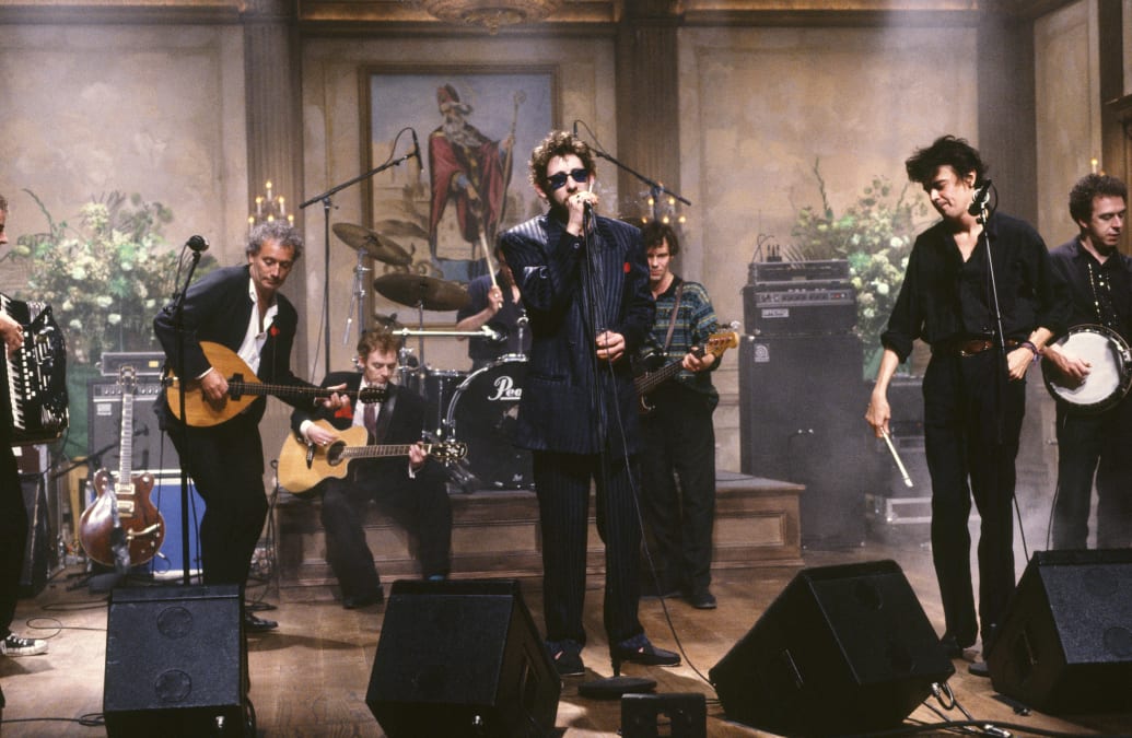 Musical guest the Pogues perform on Saturday Night Live on March 17, 1990