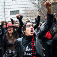 Women protest in front of the court while Harvey Weinstein attends a pretrial session on January 10, 2020 in New York City. 