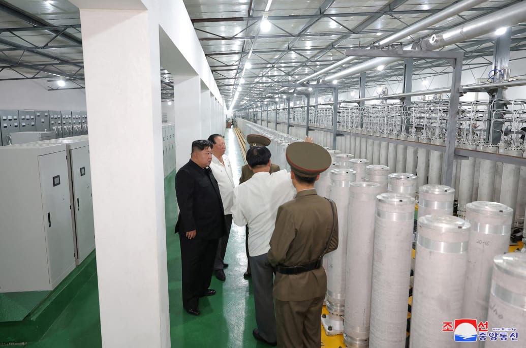 North Korean leader Kim Jong Un tours a facility involved in the development of weapon-grade nuclear materials at an undisclosed location in North Korea.