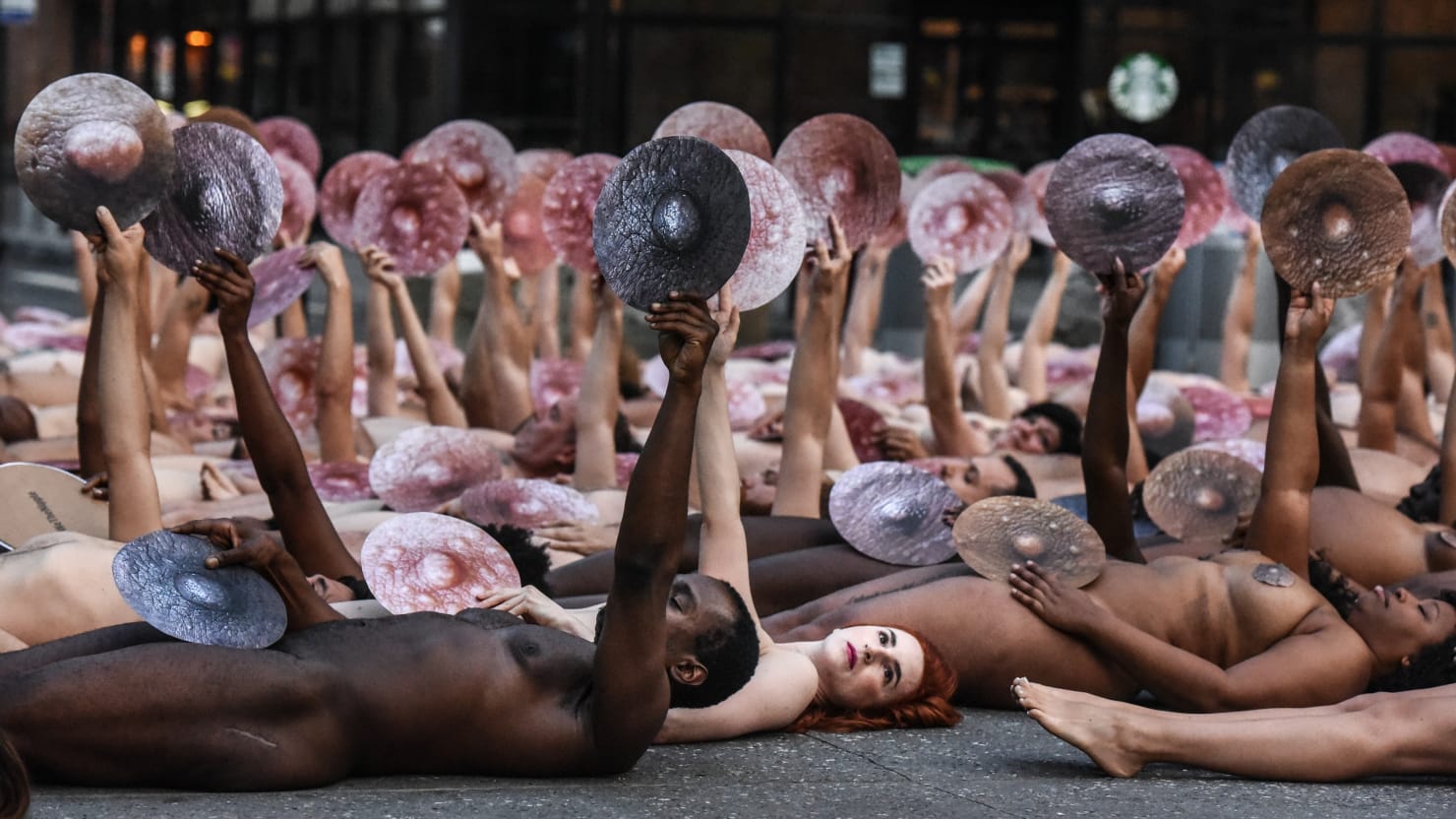 Nude Demonstrators Lie in Front of Facebook's Headquarters to Protest  Censorship