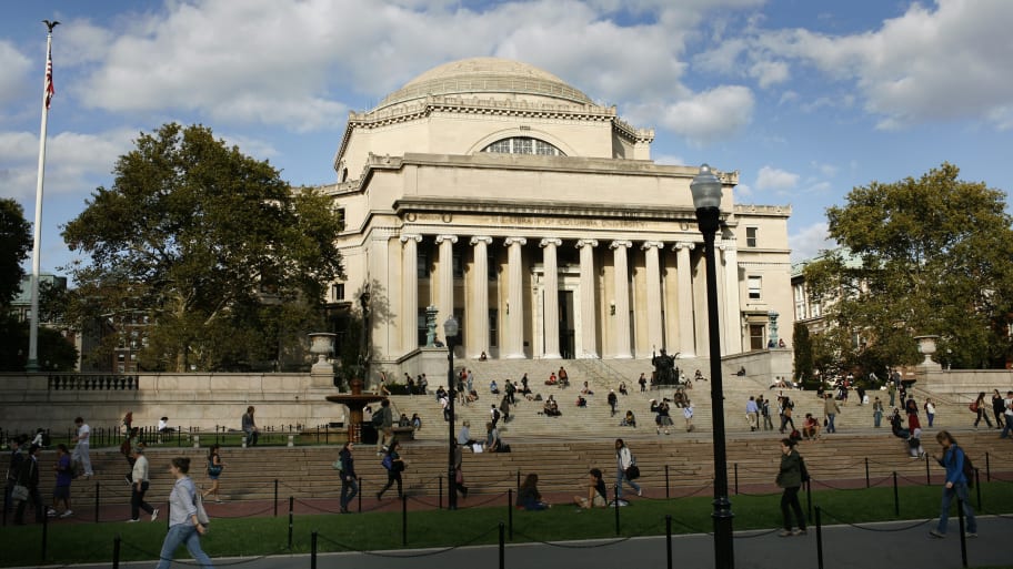 Students walk across the campus of Columbia University in New York, Oct. 5, 2009.