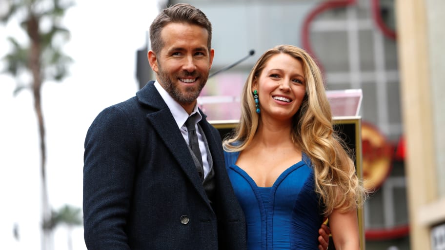 Actor Ryan Reynolds poses with his wife Blake Lively after unveiling his star on the Hollywood Walk of Fame in Hollywood.