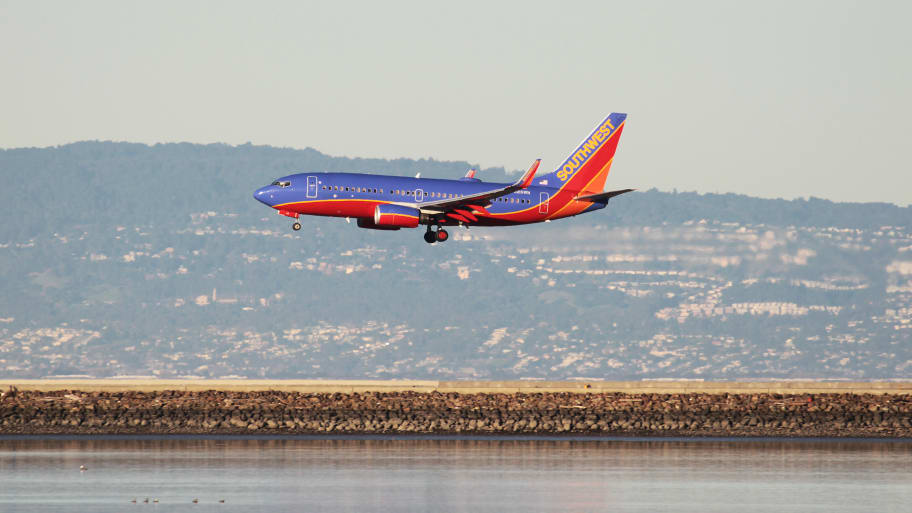 A Southwest Airlines Boeing 737-800 lands at San Francisco International Airport, San Francisco, California, February 14, 2015.