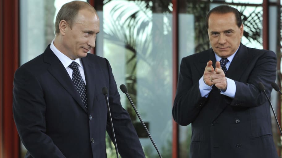 Photograph of Vladimir Putin and Silvio Berlusconi.