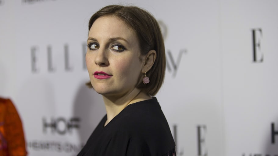 Actress Lena Dunham poses at Elle Magazine annual Women in Television dinner in Los Angeles