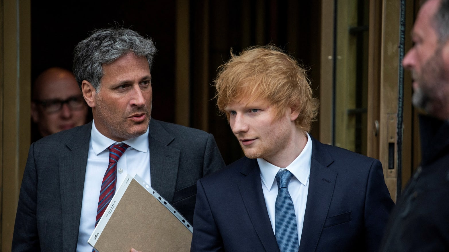 Singer Ed Sheeran exits the Manhattan federal court for his copyright trial. 