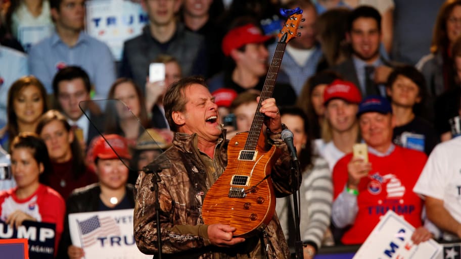 Musician and political activist Ted Nugent performs for the audience during a campaign rally for U.S. Republican presidential nominee Donald Trump at the Devos Place in Grand Rapids, Michigan November 7, 2016.