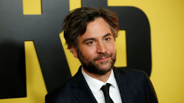 Josh Radnor poses at a premiere for the television series "Hunters" in Los Angeles, California, U.S., February 19, 2020.