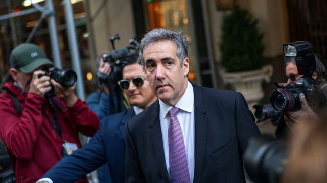 Michael Cohen leaves court in New York