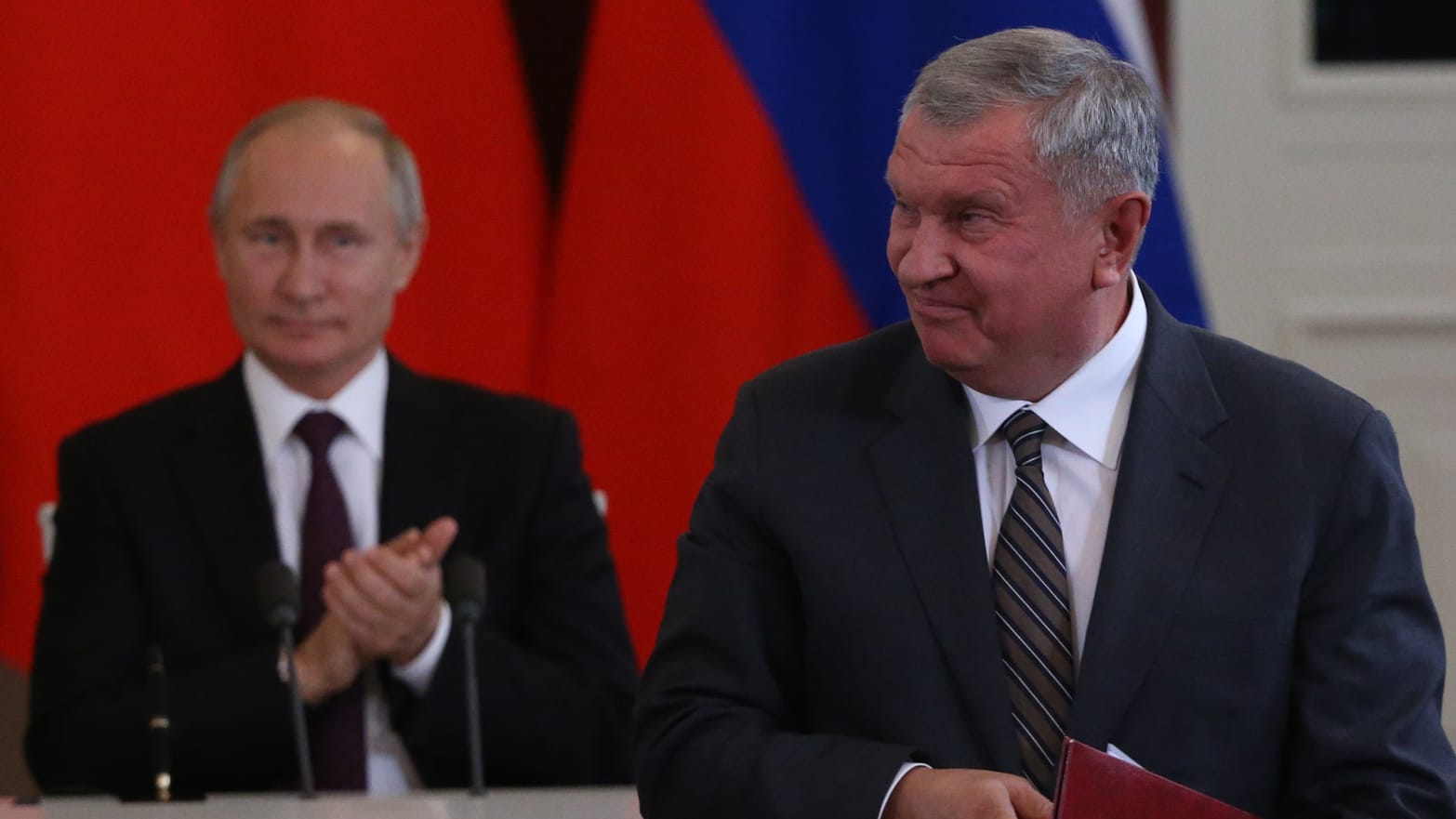  Russian President Vladimir Putin (L) looks at Rosneft President Igor Sechin (R) during Russian-Chinese talks at the Grand Kremlin Palace  in Moscow, Russia.
