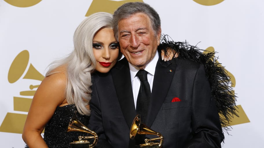 Lady Gaga and Tony Bennett pose in the press room during the 57th annual Grammy Awards in Los Angeles, California, Feb. 8, 2015.