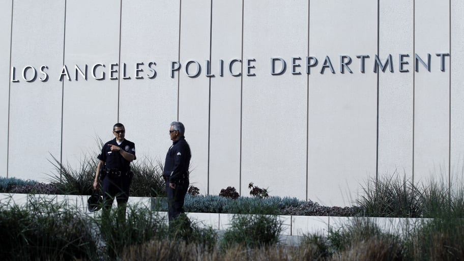 Police officers patrol outside LAPD headquarters in Los Angeles, California 