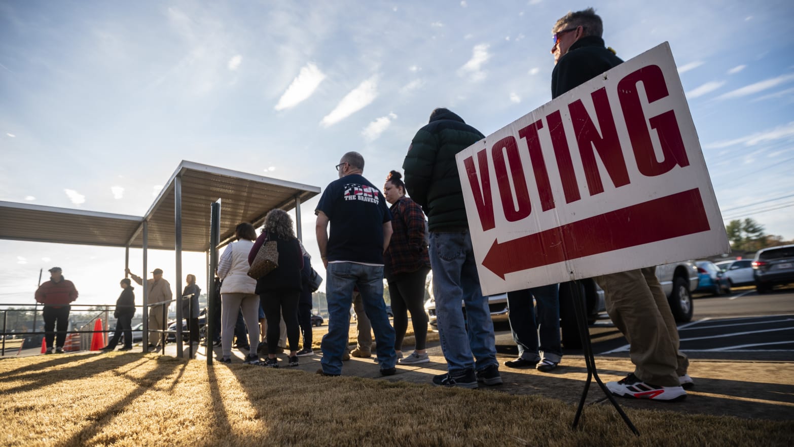 People are seen in line to vote at the sole polling place open for Saturday early voting in Bartow County.