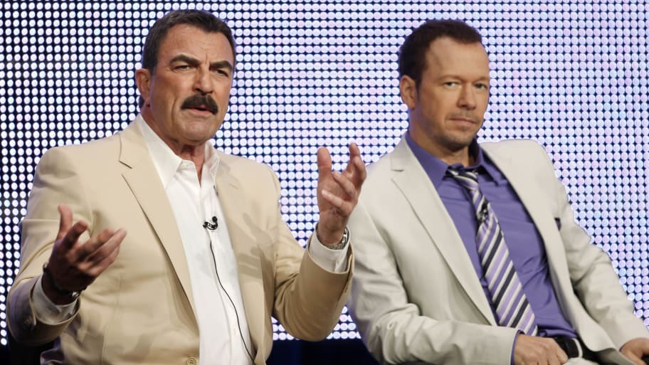 Tom Selleck (L) and Donnie Wahlberg talk about their show 'Blue Bloods' during the CBS, Showtime and the CW Television Critics Association press tour