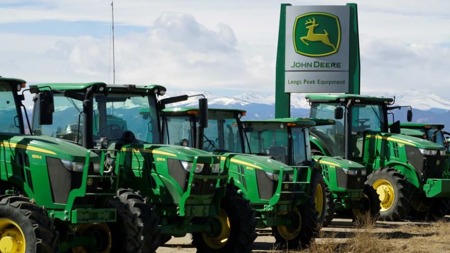 John Deere tractors are seen for sale at a dealer in Longmont, Colorado, Feb. 21, 2017.