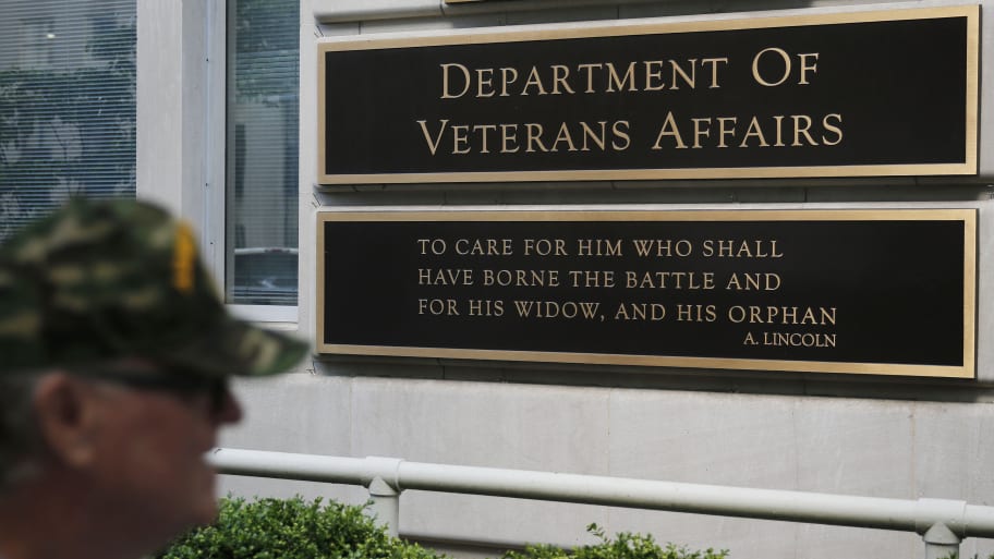 The Veterans Affairs Department’s motto is shown on a plaque