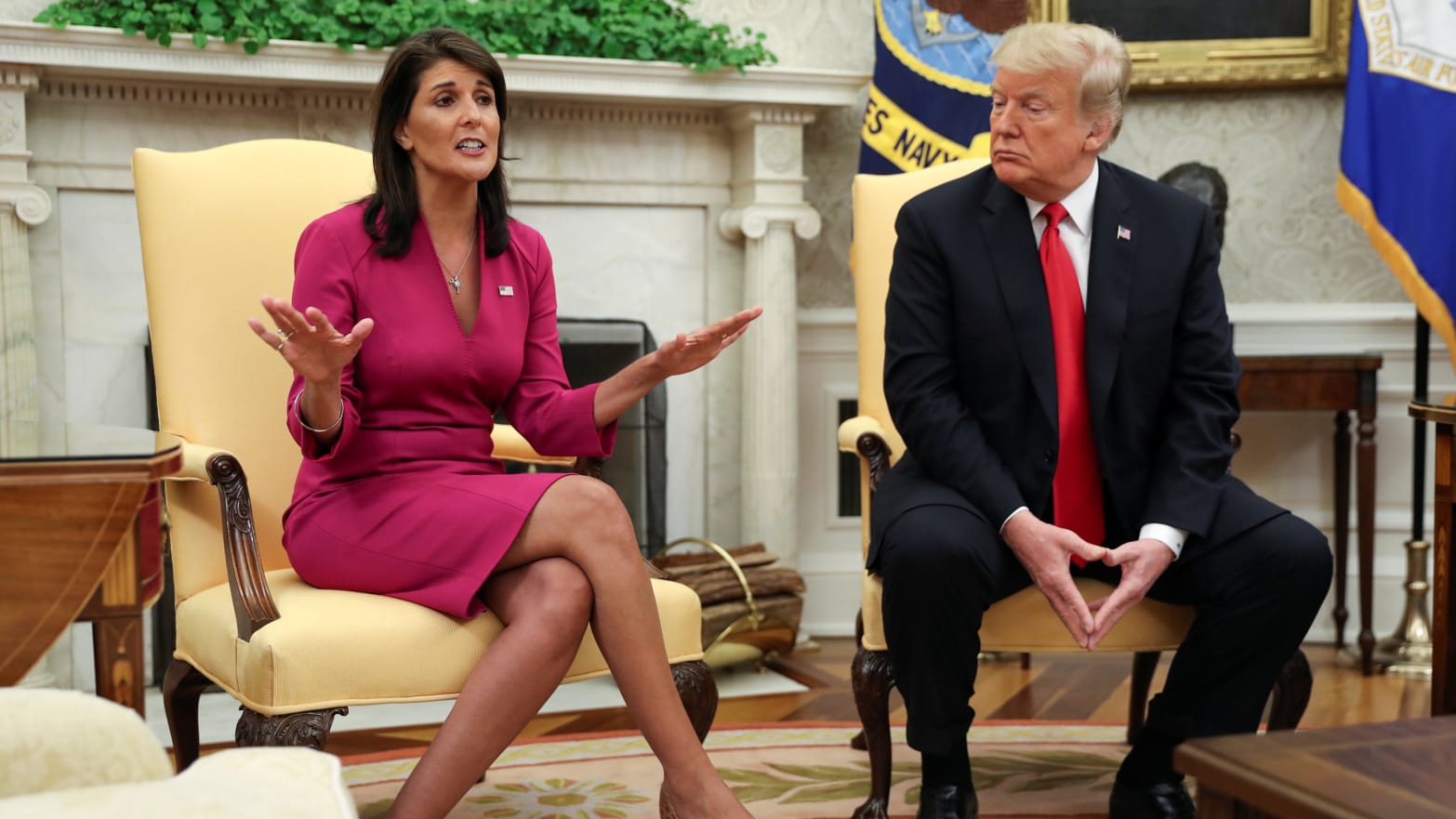 Former President Donald Trump listens to U.N. Ambassador Nikki Haley 