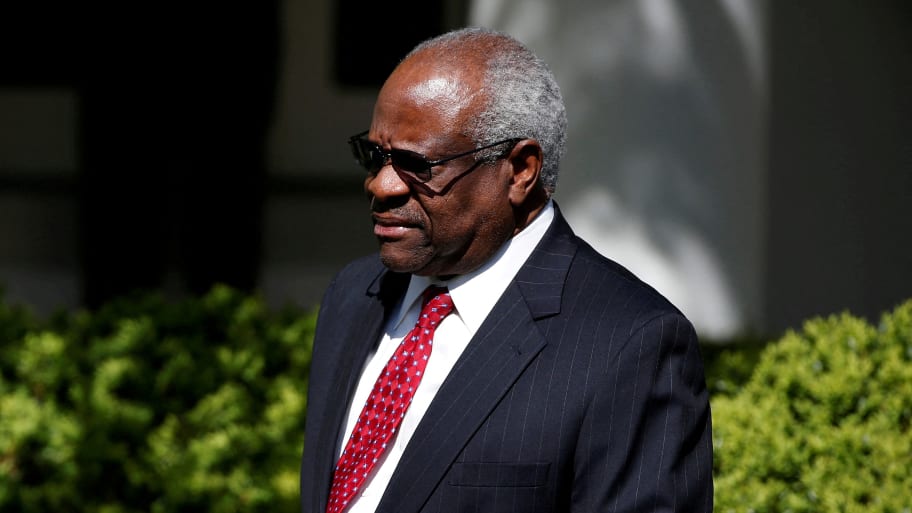 Associate Supreme Court Justice Clarence Thomas arrives for the swearing in ceremony of Judge Neil Gorsuch.