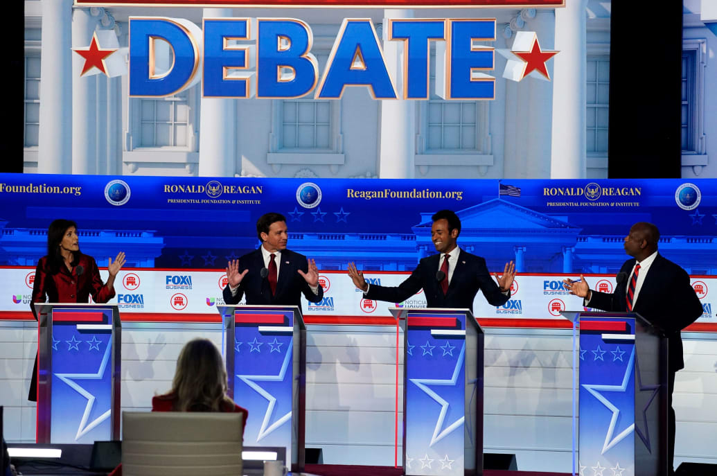 Nikki Haley, Ron DeSantis, Vivek Ramaswamy and Tim Scott standing on stage at the second primary debate.