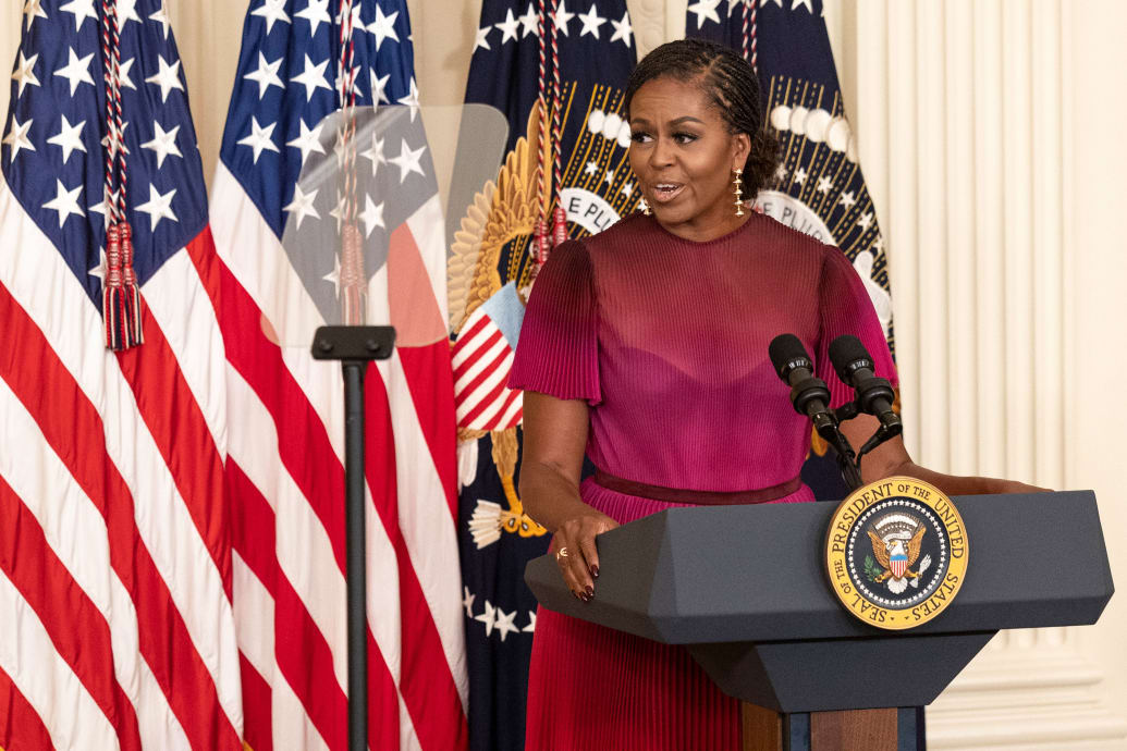 Michelle Obama delivers a speech in the White House