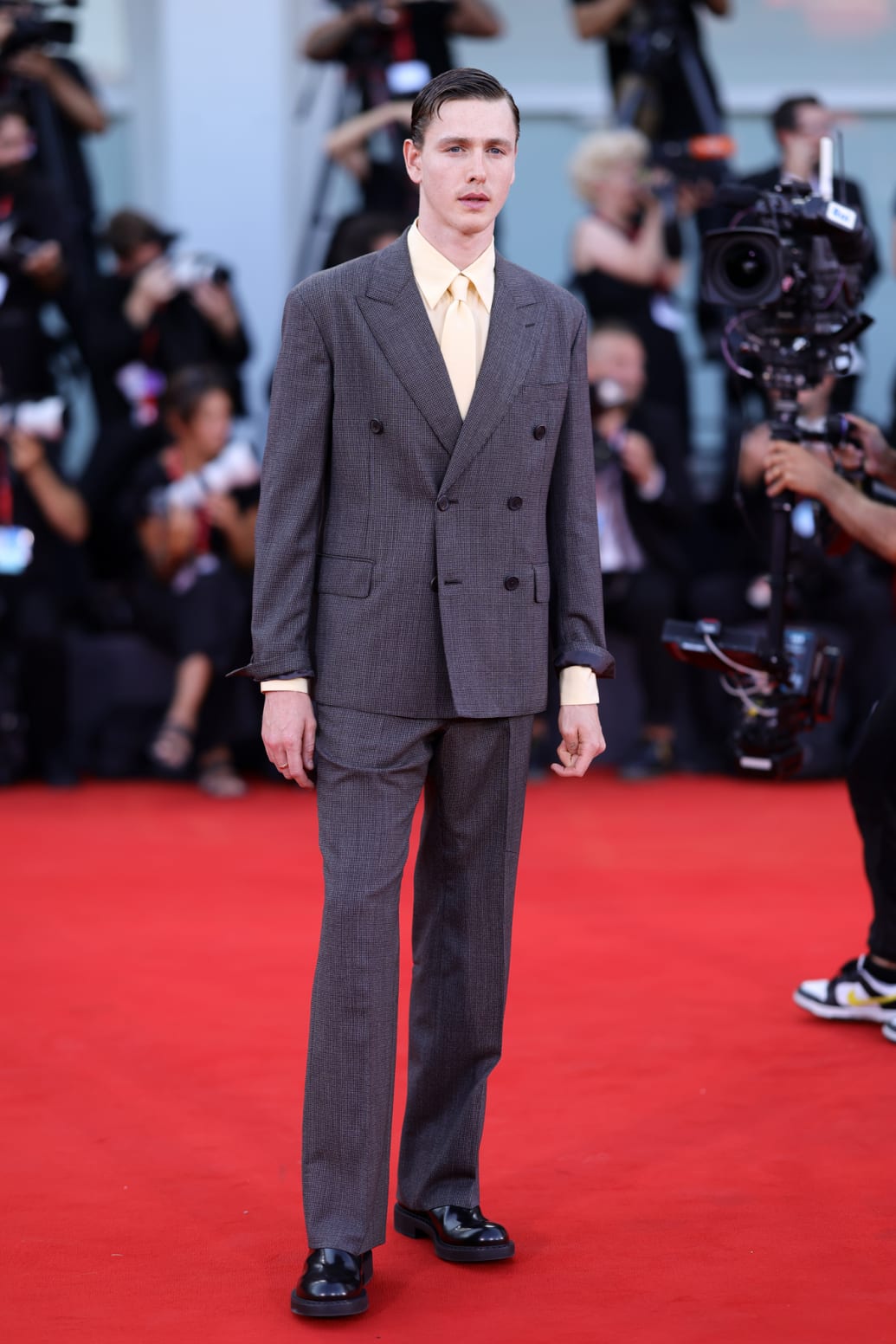 Harris Dickinson poses on the red carpet during the Venice Film Festival on August 30, 2024.