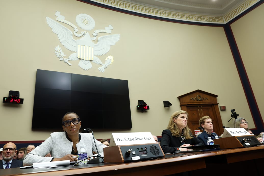 A picture of Dr. Claudine Gay, Liz Magill, Dr. Pamela Nadell, and Dr. Sally Kornbluth sitting behind a table at a hearing in Washington.