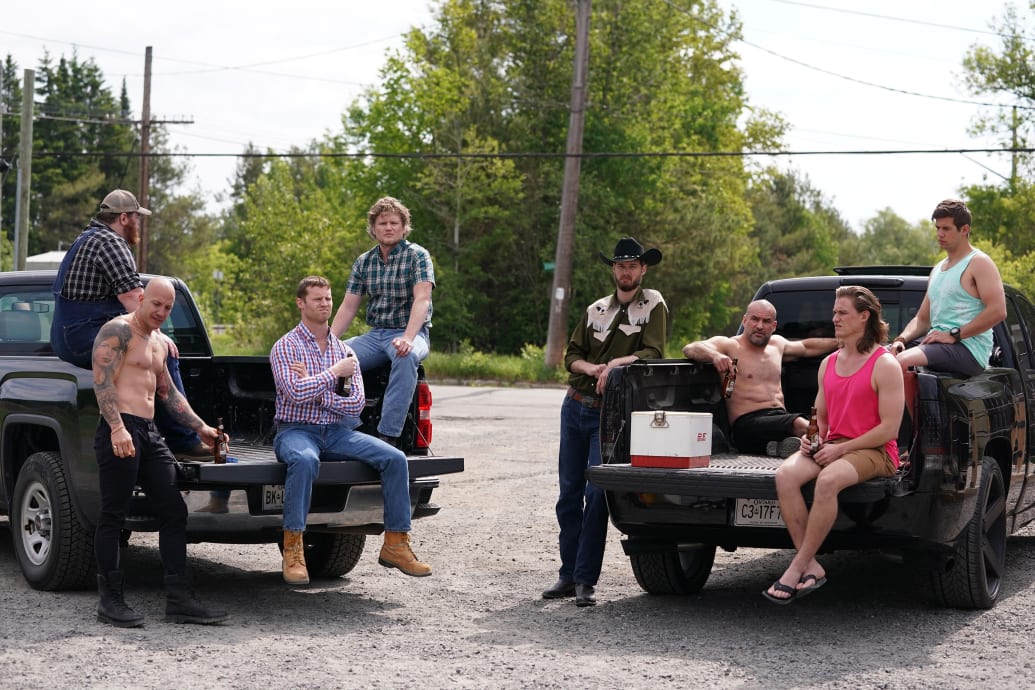 The cast of 'Letterkenny' sitting in the back of trucks