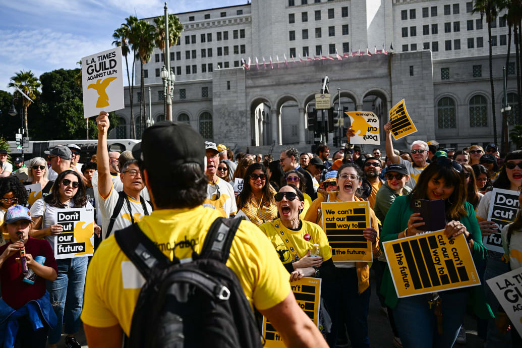 A photo of LA Times Guild members in front of Los Angeles City Hall protesting