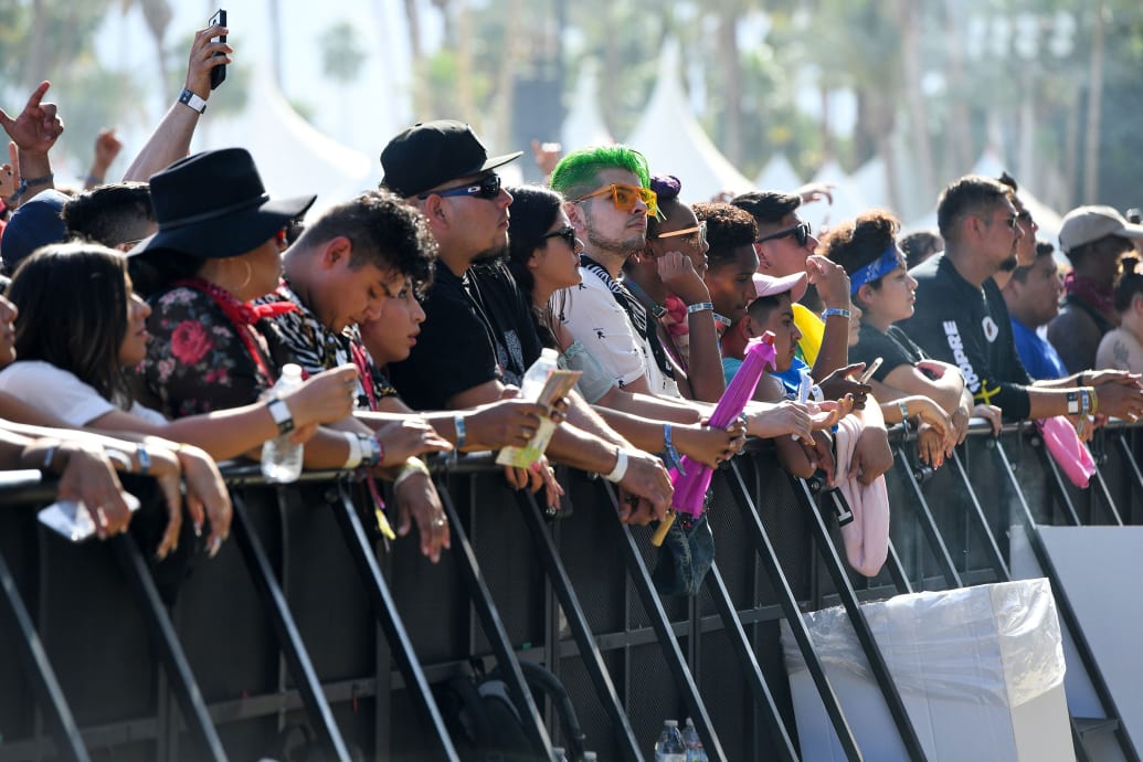 A photo of fans lined up in a crowd at Coachella