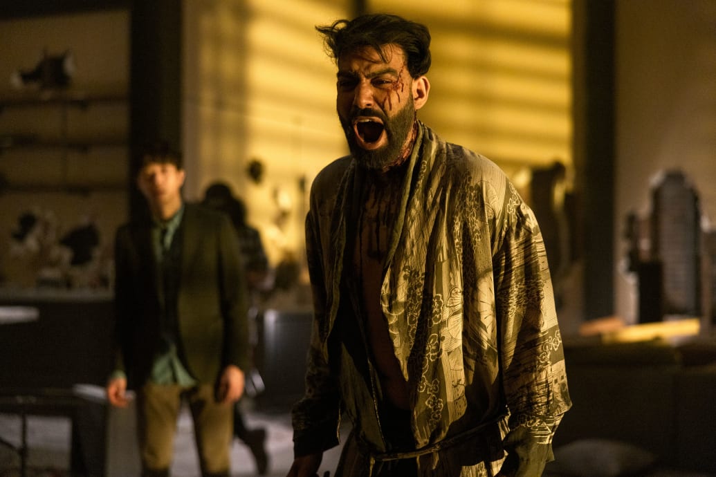 Rahul Kohli covered in blood and screaming  in a still from ‘The Fall of the House of Usher’