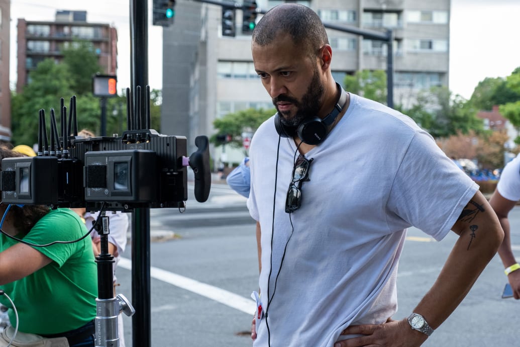 Cord Jefferson looks through a camera on the set of ‘American Fiction’