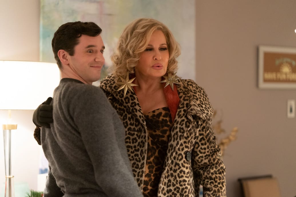 Michael Urie, left, as Peter, Jennifer Coolidge as Aunt Sandy, in 'Single All The Way.'