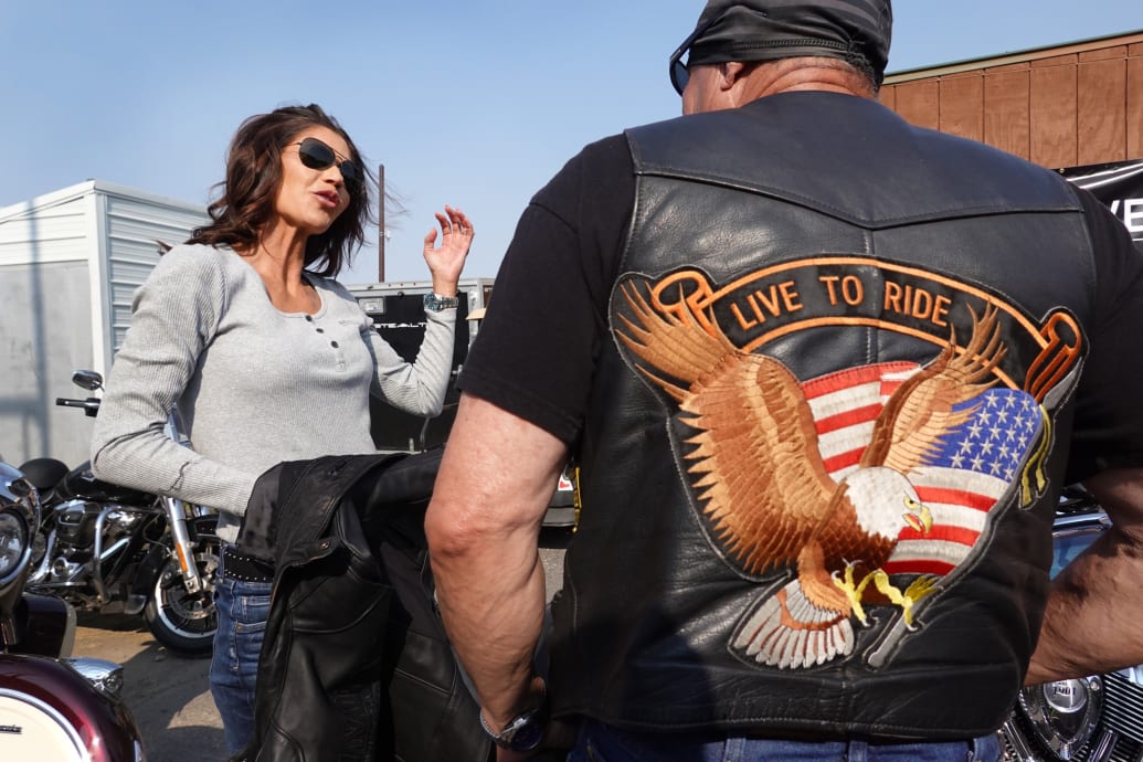 Governor Kristi Noem of South Dakota arrives at the Sturgis Buffalo Chip campground after riding in the Legends Ride for charity in 2021