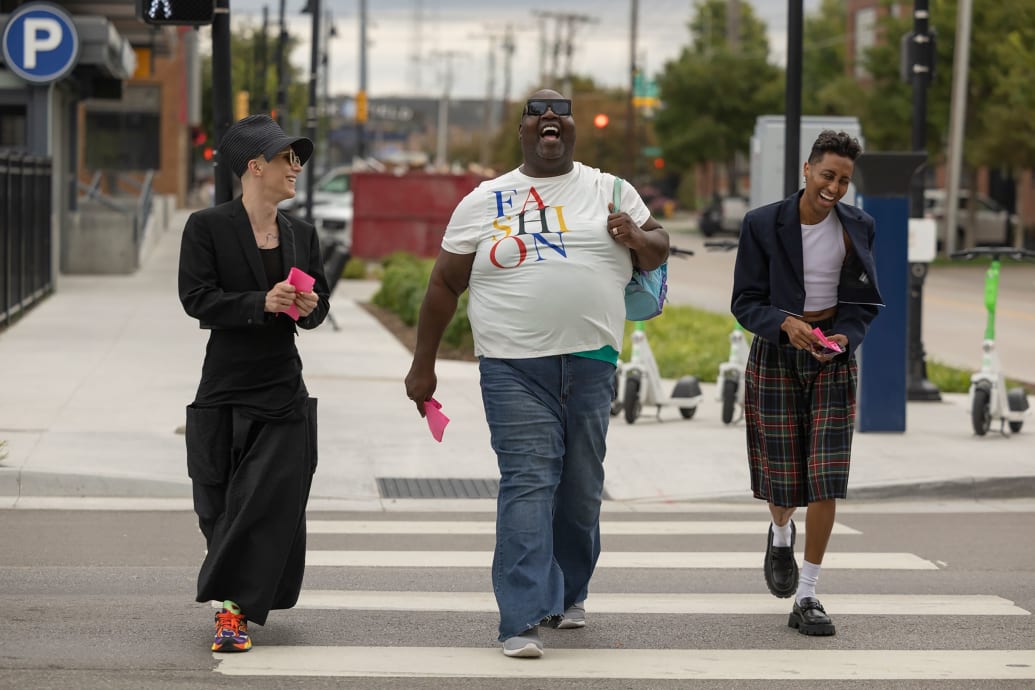 Latrice Royale, Sasha Velour, and Priyanka walk down the street in a still from 'We're Here'