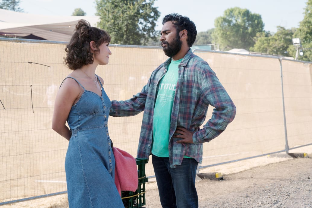 Himesh Patel talks to Lily James in a still from ‘Yesterday’
