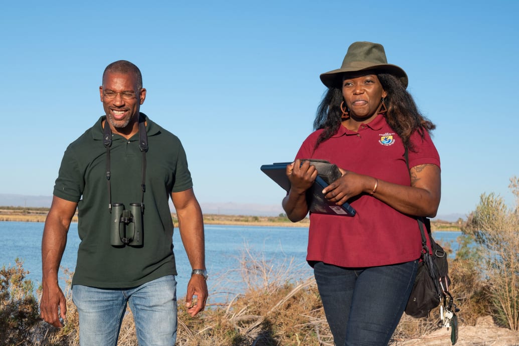 Christian Cooper takes a walk with Alicia Thomas at the Sonny Bono Salton Sea National Wildlife Refuge.