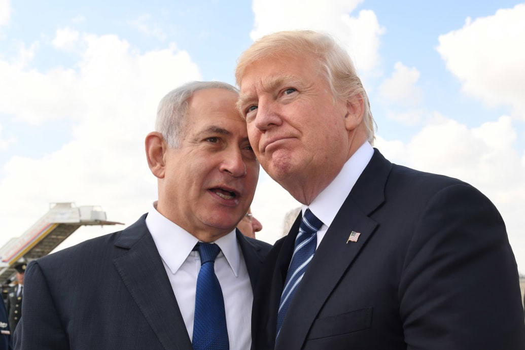 A photo of Israeli Prime Minister Benjamin Netanyahu speaking with former U.S. President Donald Trump.