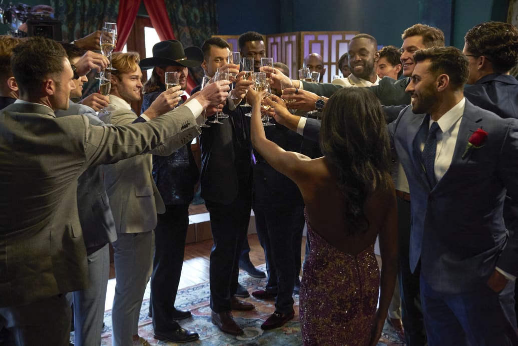 The cast of 'The Bachelorette' raise glasses and toast in season premiere.