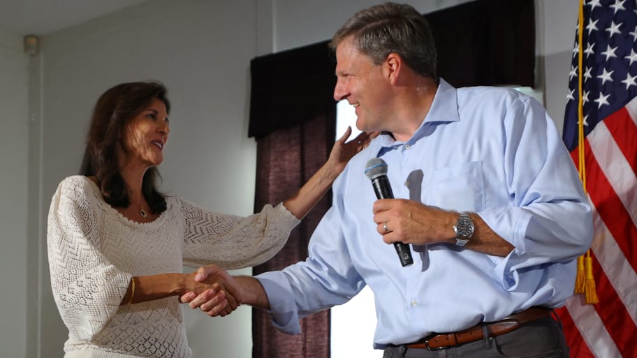 Nikki Haley is introduced by New Hampshire Gov. Chris Sununu at a campaign town hall meeting in Merrimack, New Hampshire, Sept. 6, 2023. 