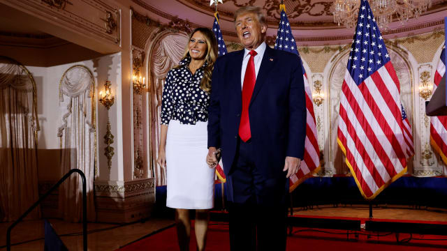 Melania Trump and Donald Trump stand onstage together after Trump announced that he would once again run for U.S. president in the 2024 U.S. presidential election during an event at his Mar-a-Lago estate in Palm Beach, Florida, Nov. 15, 2022.
