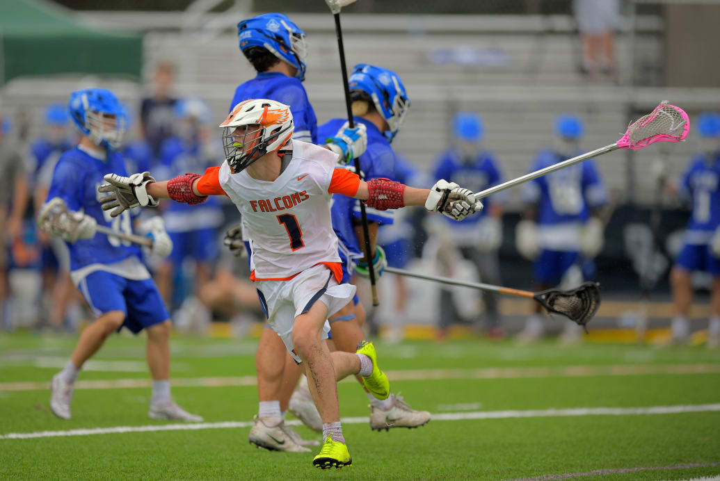 A picture of a young male lacrosse player