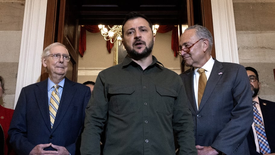 Ukrainian President Volodymyr Zelensky (C) speaks to reporters briefly following a meeting with Senate Minority Leader Mitch McConnell (R-KY) (2nd L), Senate Majority Leader Charles Schumer (D-NY) (2nd R)