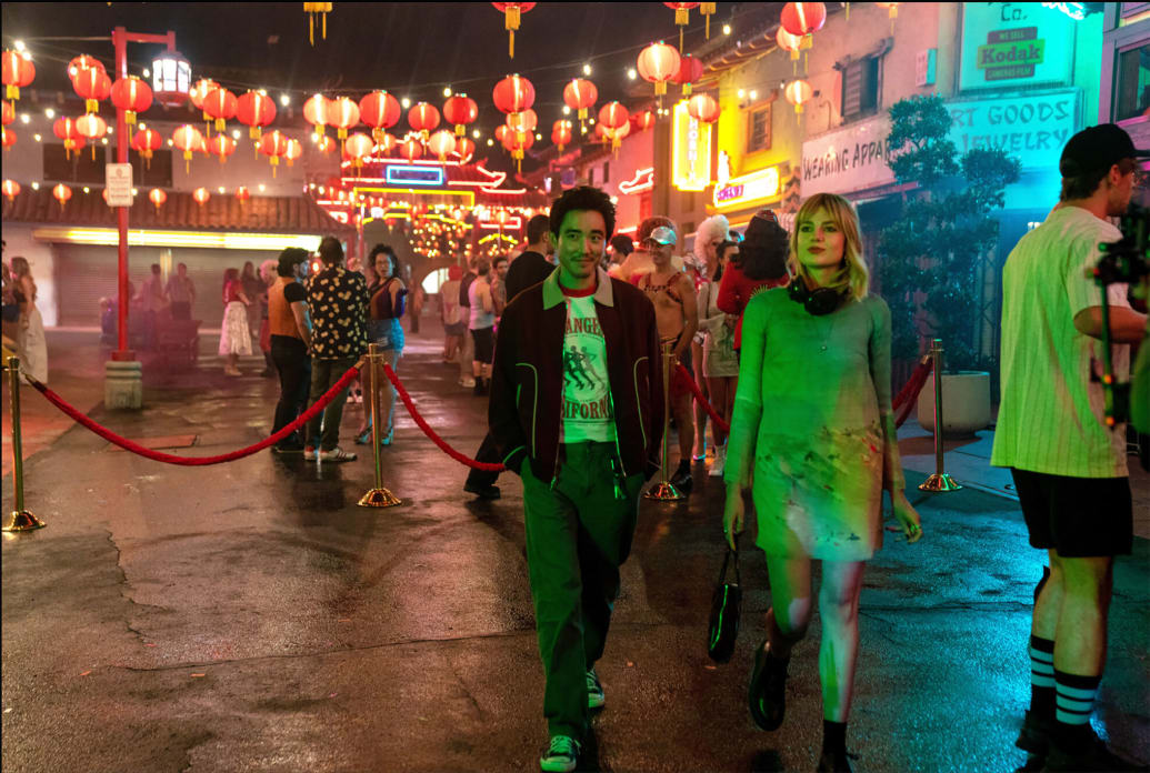 Lucy Boyton and Justin Min walking in a still from 'The Greatest Hits'