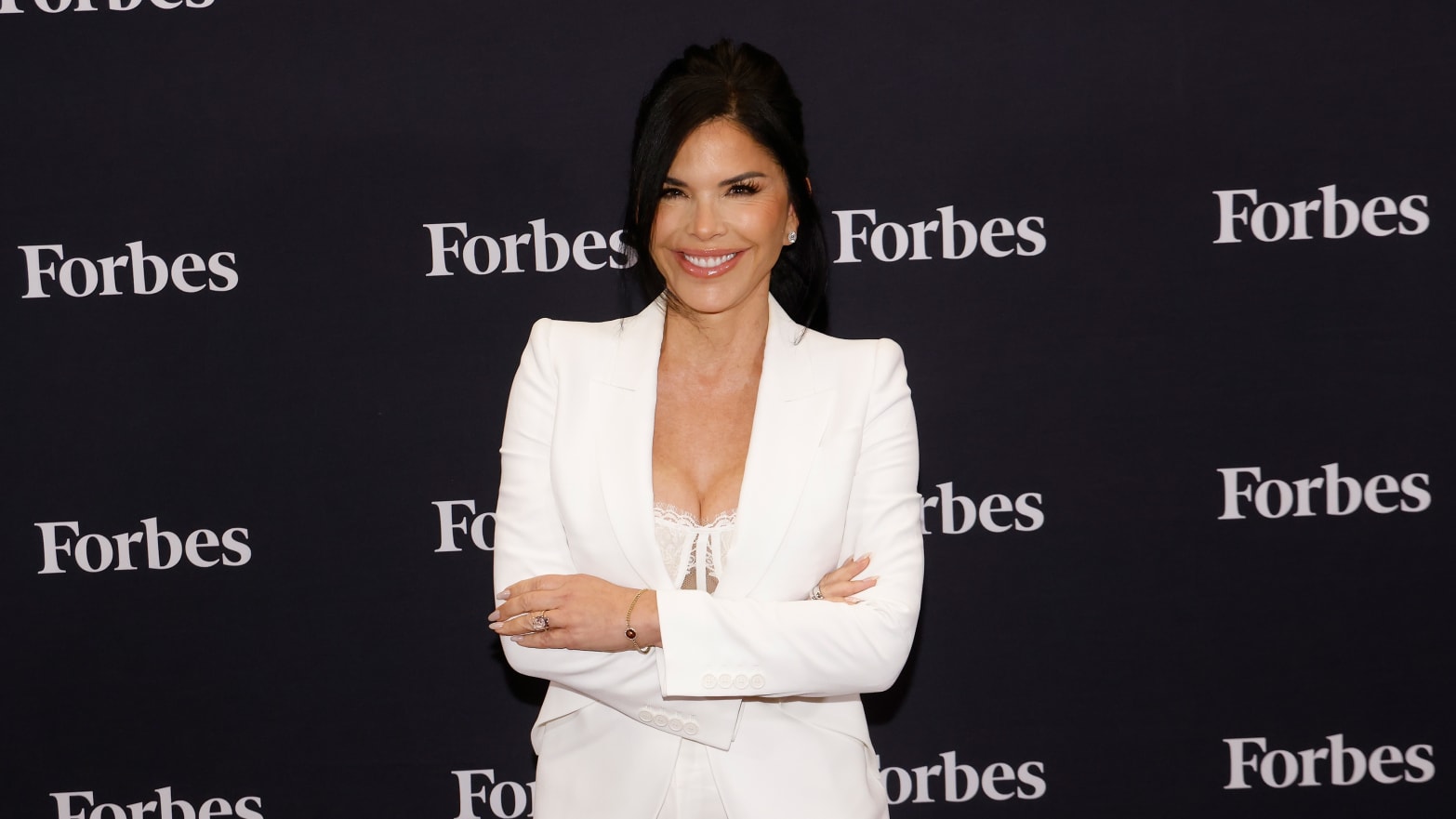 Lauren Sanchez wears a white suit at the 2024 Forbes Power Women's Summit on September 11, 2024 in New York City.